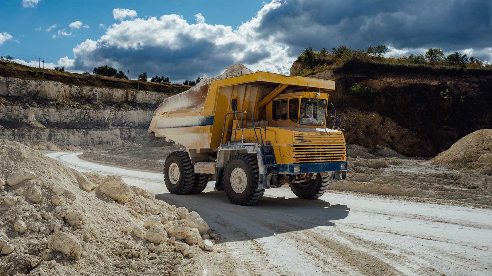 Chalk-quarry.-Moving-dump-truck-loaded-with-chalk