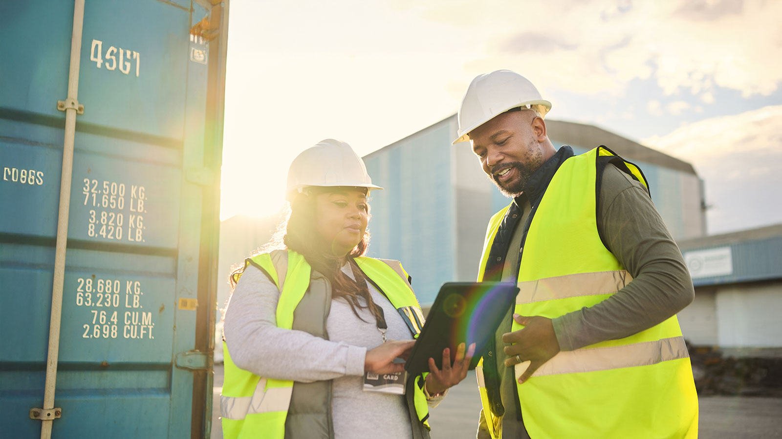 Ecommerce, supply chain and tablet with a man and woman working as a team in logistics