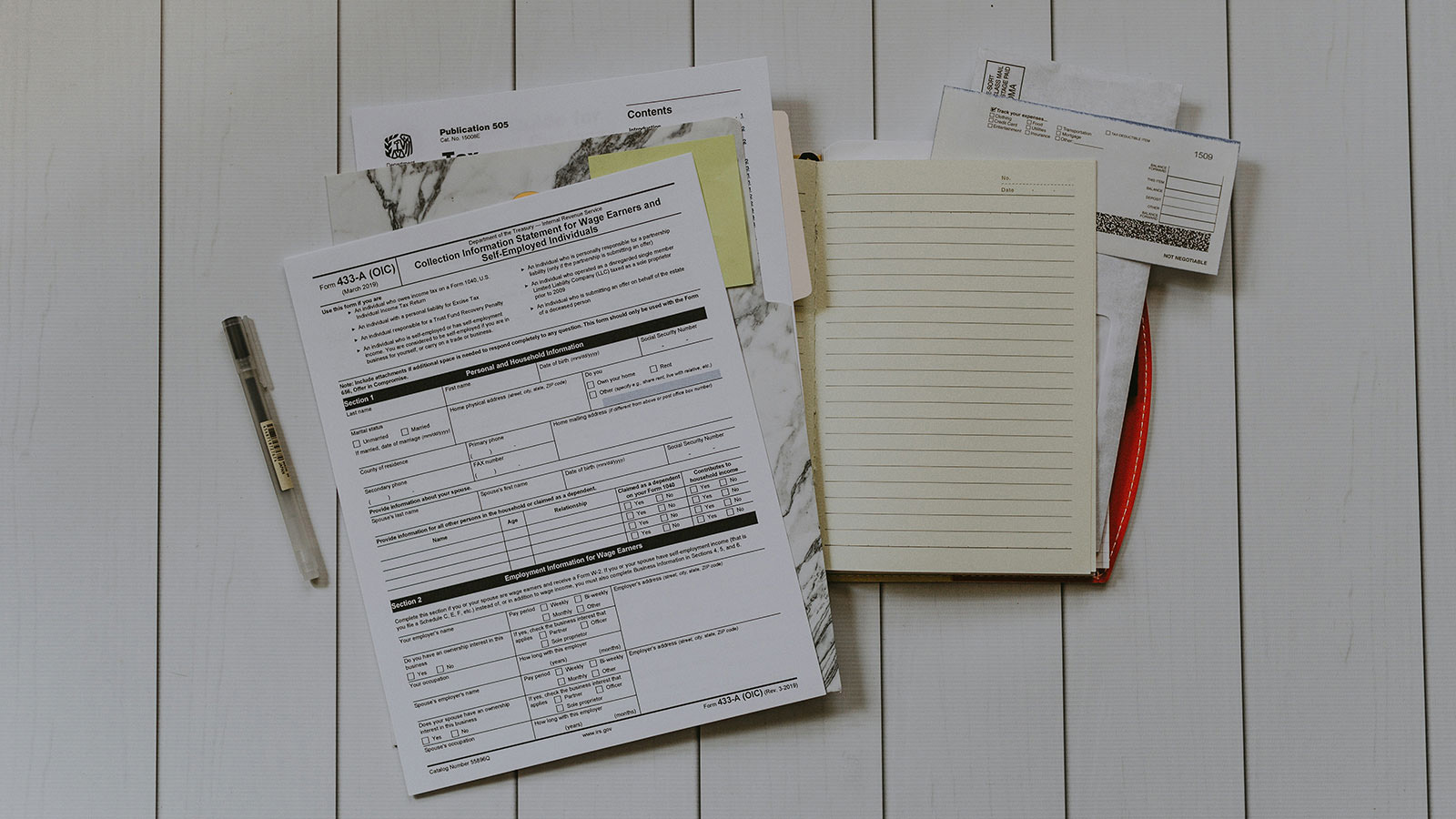 Stack of papers lay flat