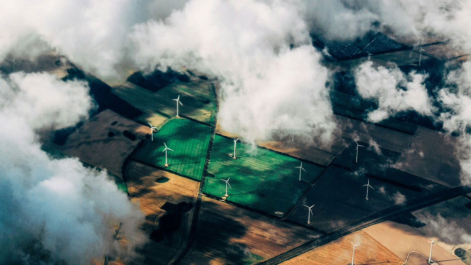 Aerial view of windmill and field