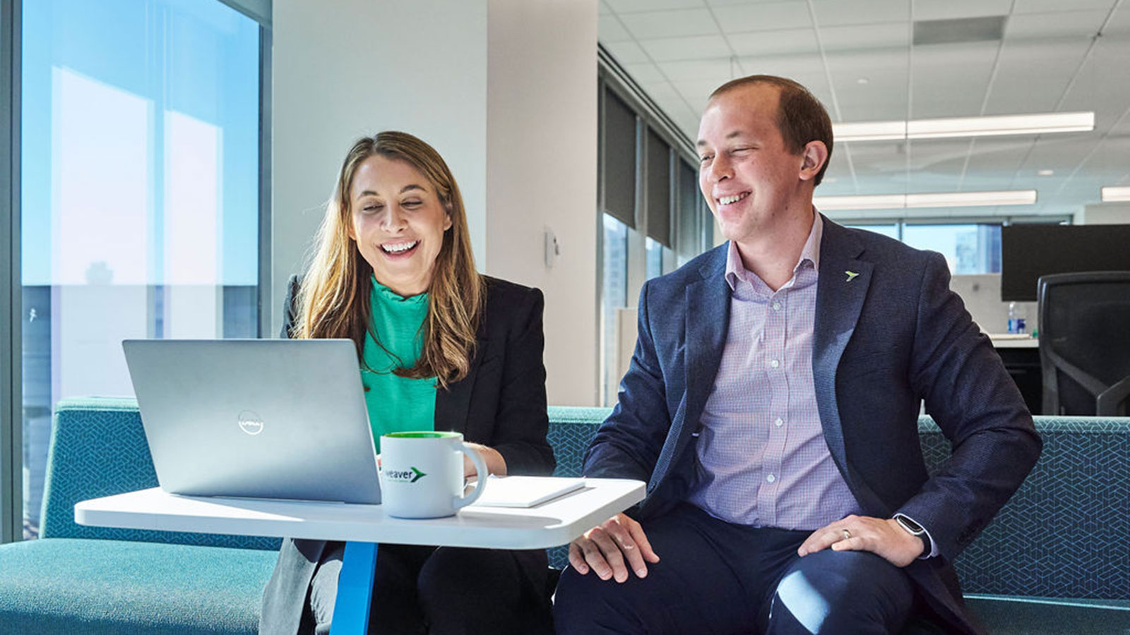 Weaver employees working together